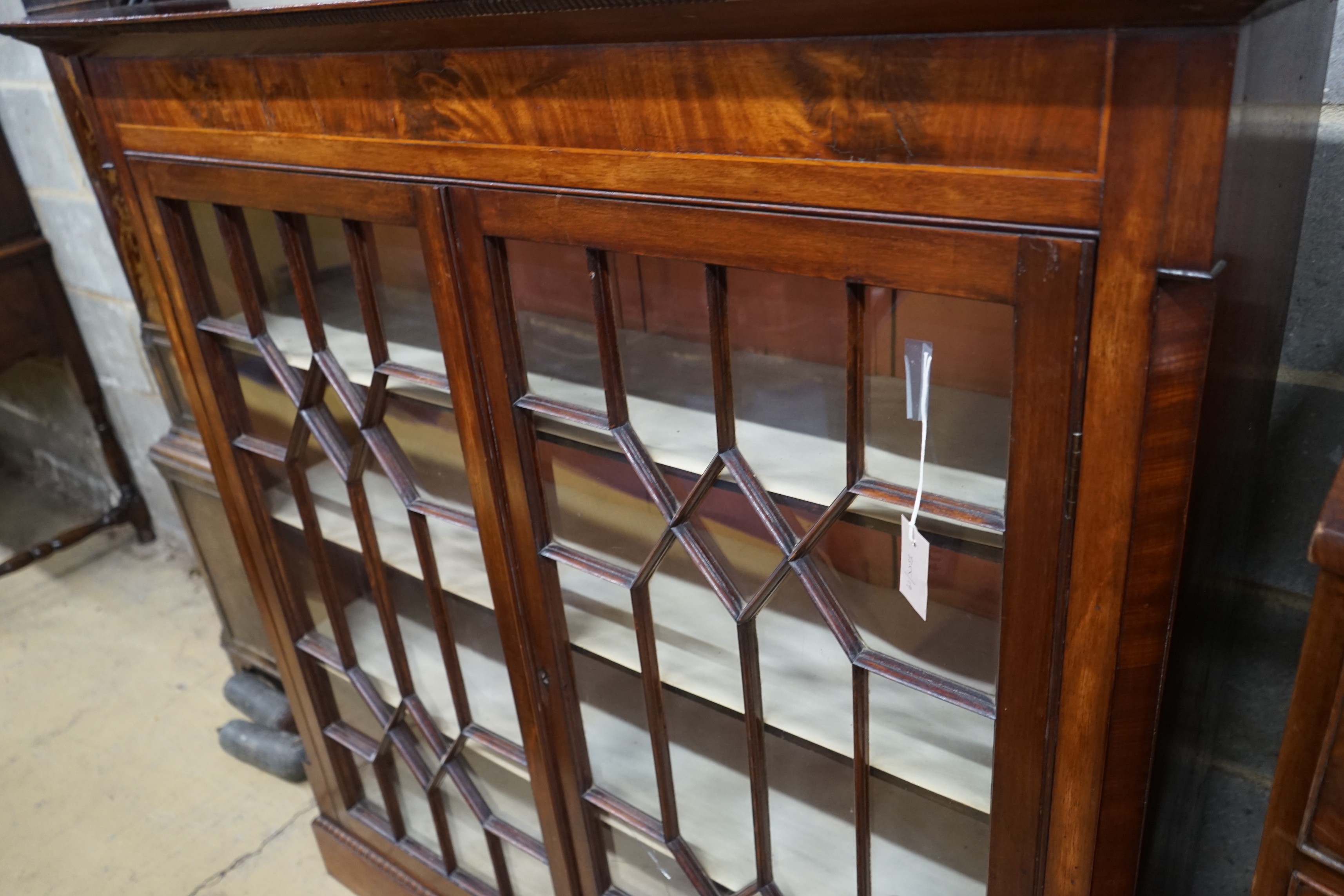 A George III and later mahogany bookcase (altered), length 128cm, depth 33cm, height 129cm